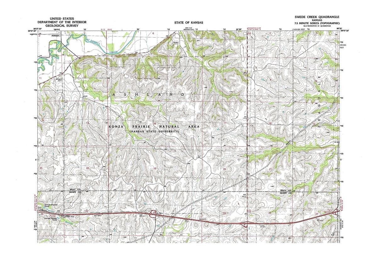 A USGS topographic map with brown contour lines and green woodland